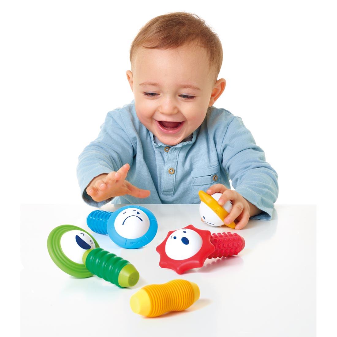 Child playing with the SMARTMAX My First Sounds and Senses set