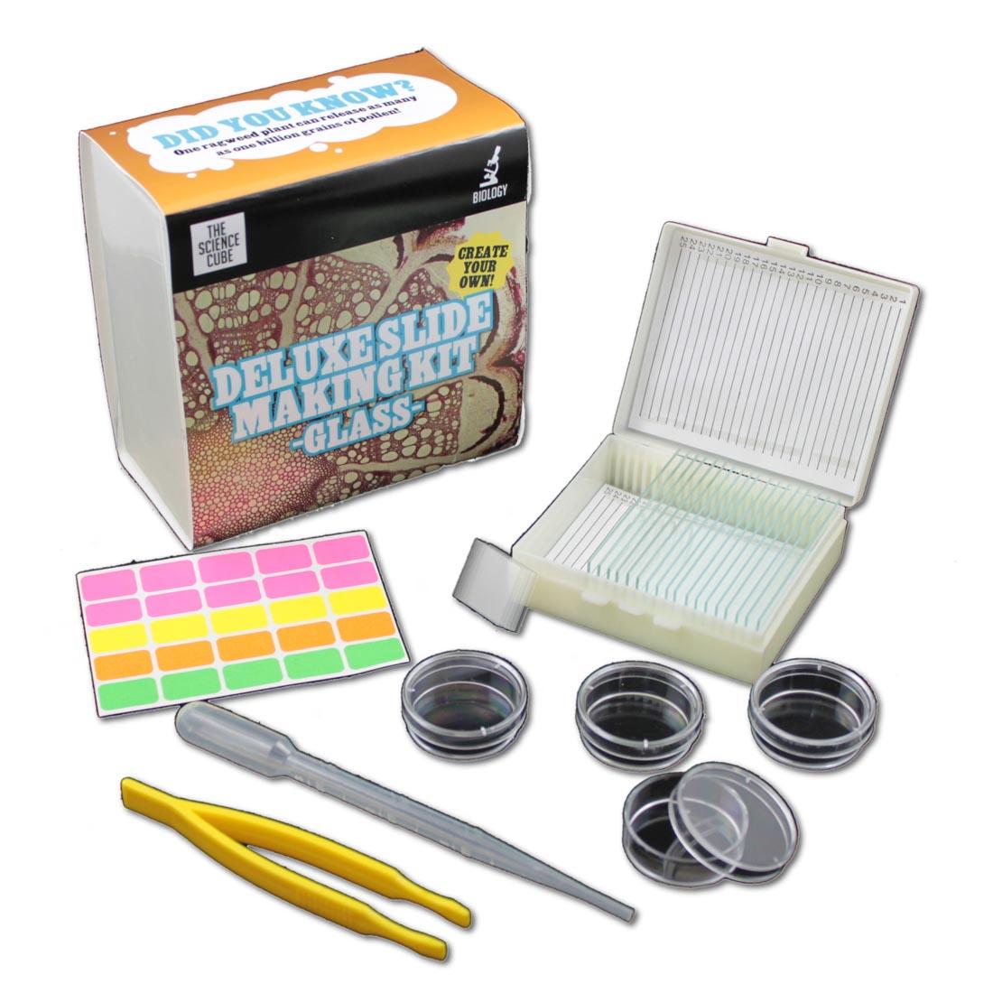 Components of The Science Cube Deluxe Glass Slide Making Kit, including petri dishes, pipette, forceps, labels and glass slides