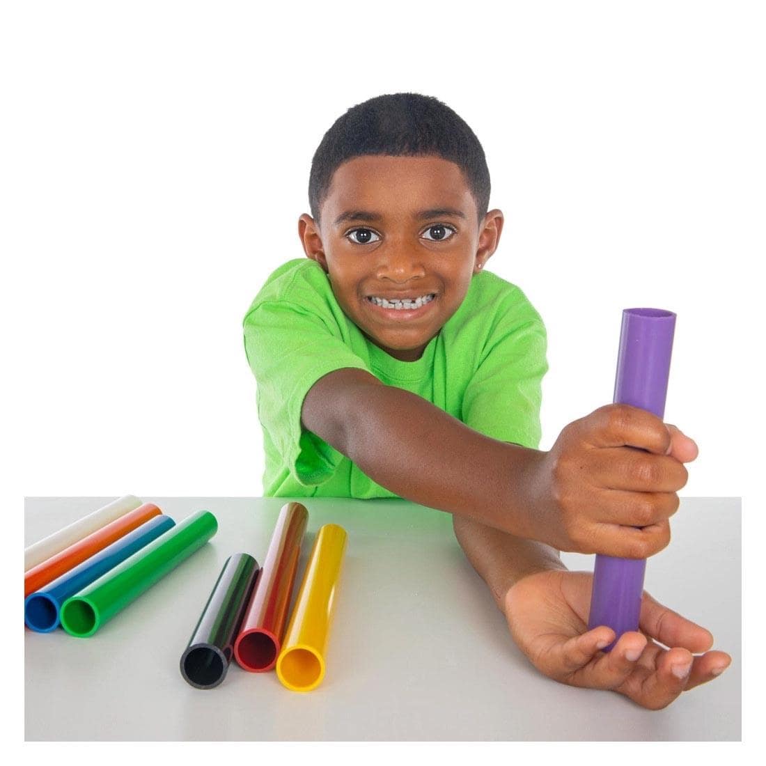 Child playing with Palm Pipes By Steve Spangler Science