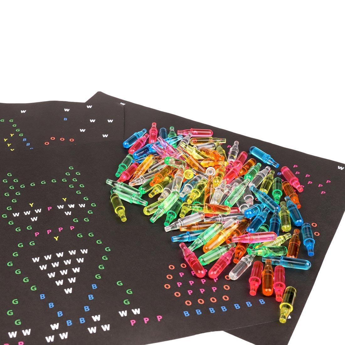 Template sheets and pegs from the Lite-Brite Refill Set