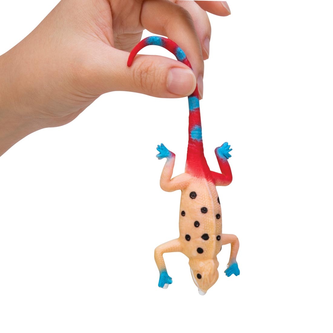 hand holding a Color Change Revealeon toy that is half changed
