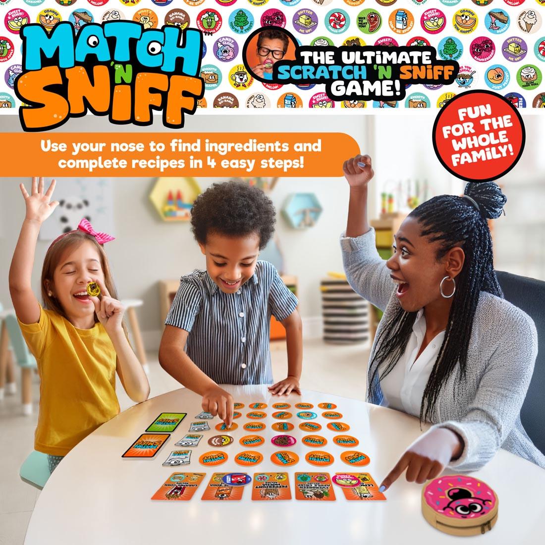 2 children and adult playing the Match 'N Sniff Sweet & Smelly Game plus text Use your nose to find ingredients and complete recipes in 4 easy steps! Fun for the whole family!