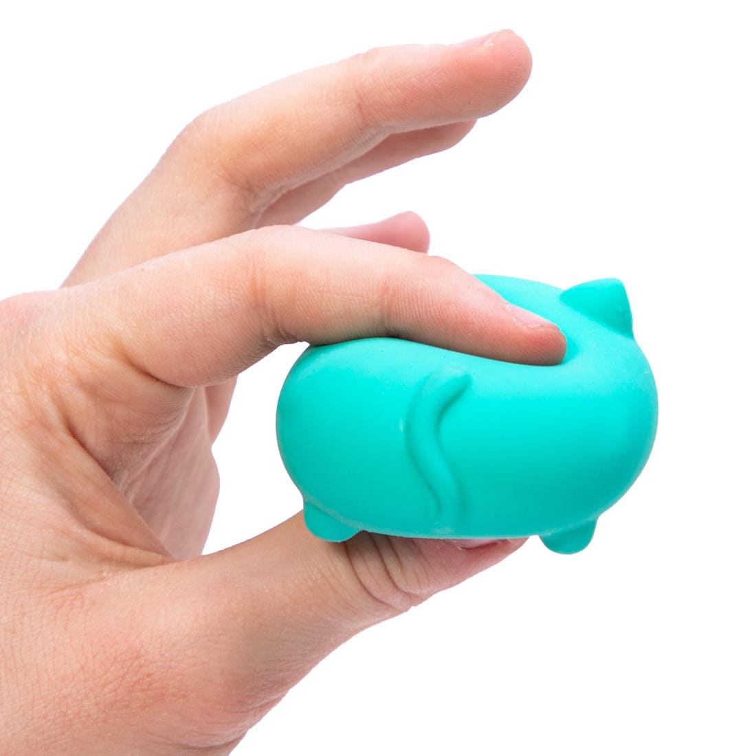 hand squishing a Teenie Nee Doh Cool Cat with thumb and forefinger
