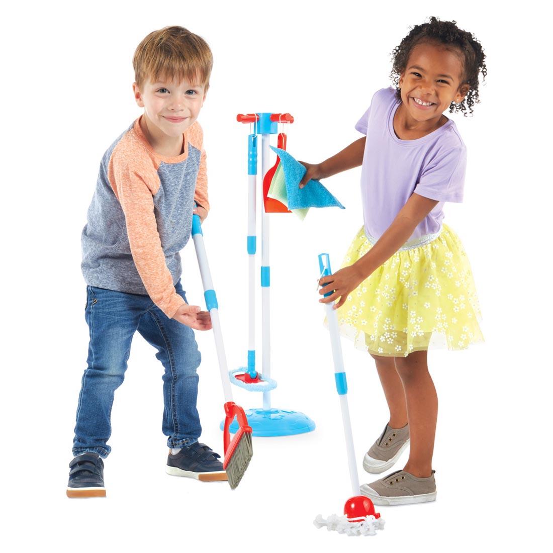 2 children sweeping and mopping with the Nice & Tidy Clean Up Kit By Schylling Toys
