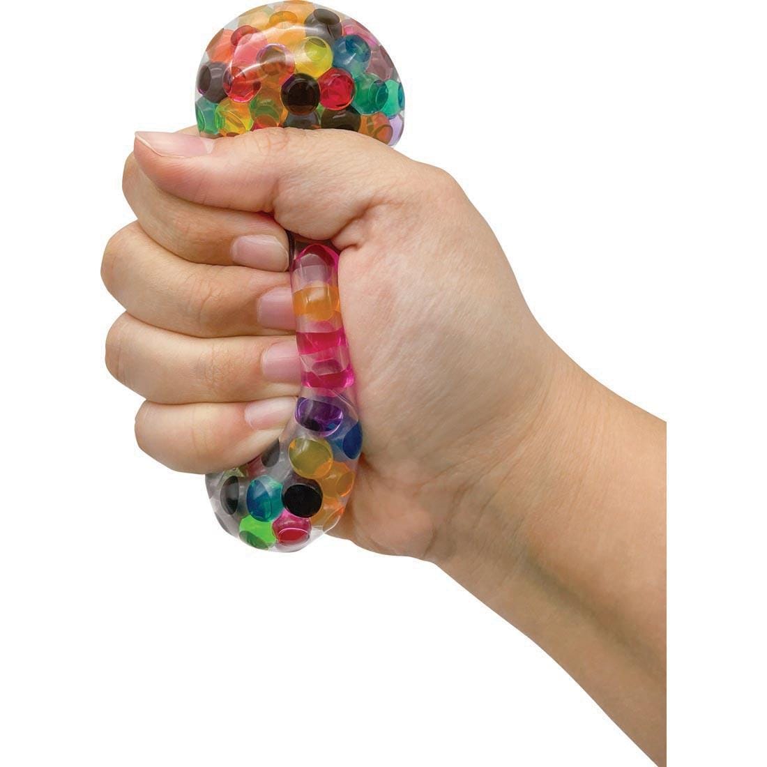 Hand squeezing a water bead squeeze ball from the Sensory Fidget Tools Box By Teacher Created Resources