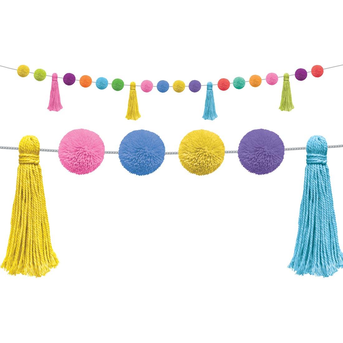 wide view plus a closeup of the Colorful Pom-Poms And Tassels Garland By Teacher Created Resources