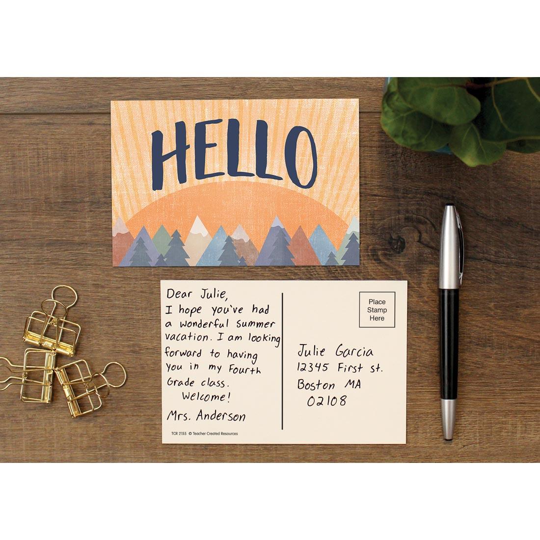 front and back with a sample message on the Hello Postcard from the Moving Mountains collection by Teacher Created Resources