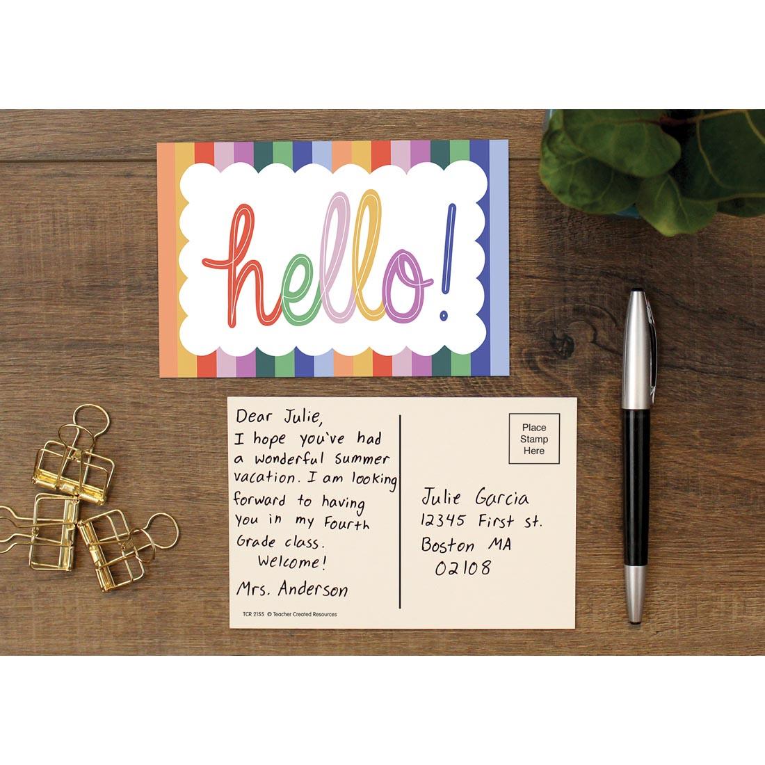 front of Hello Postcard from the Color Crush collection by Teacher Created Resources plus back of one with address and personal message written