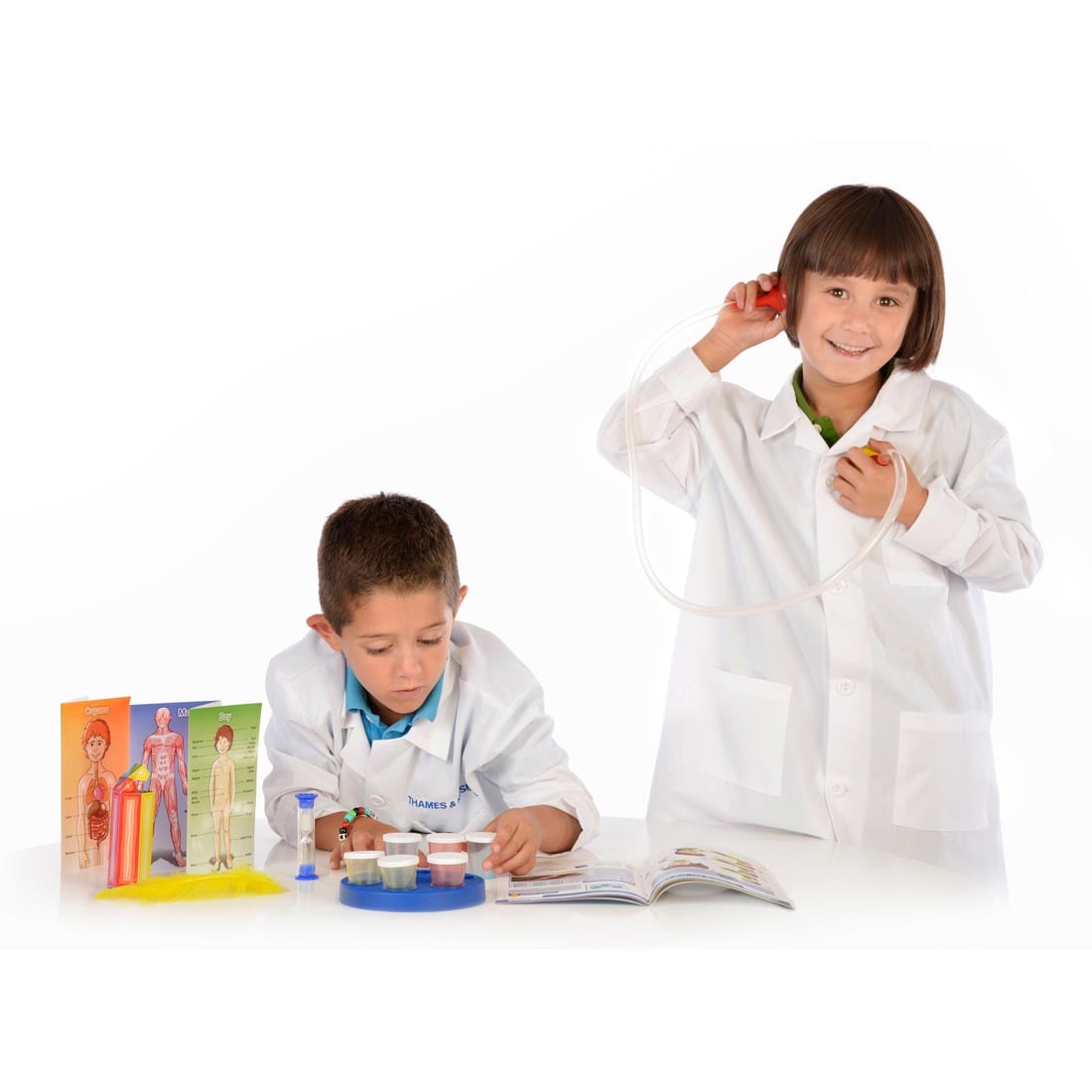 2 children using the Kids First The Human Body Science Kit