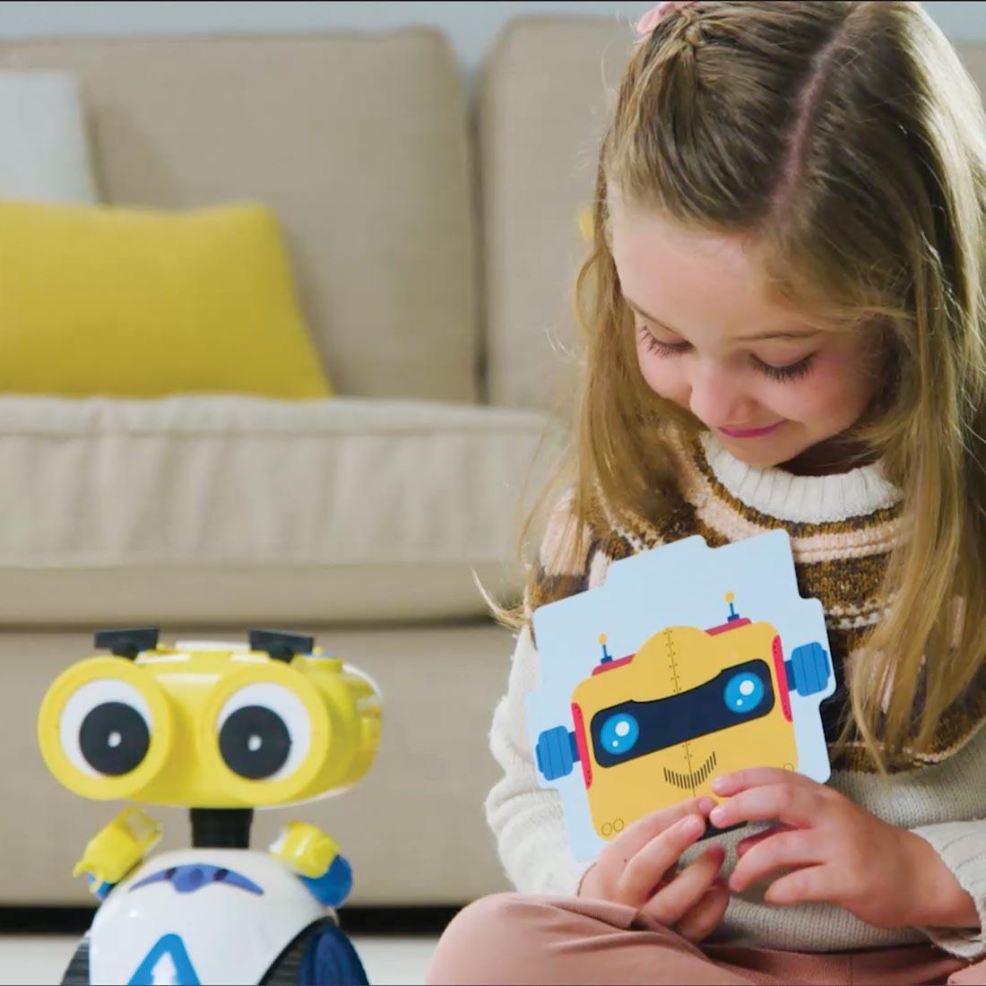 child playing with Kids First Andy: The Code & Play Robot