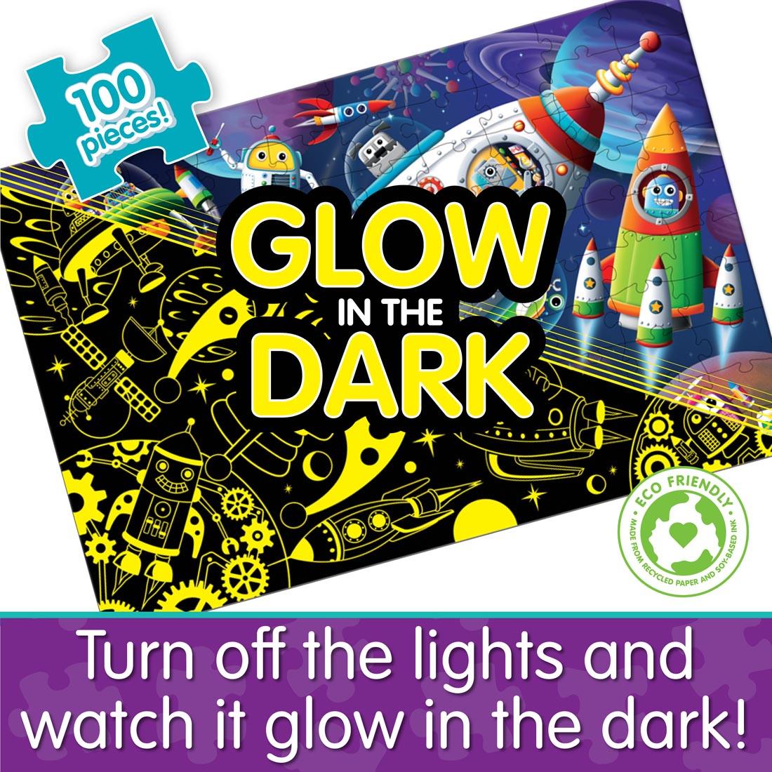 Rockets And Robots puzzle, half showing regular puzzle and half showing when the lights go out; with the words: Turn off the lights and watch it glow in the dark!