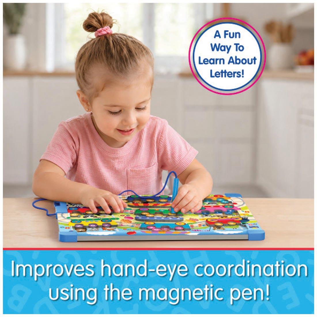 child using the Sort & Learn Magnetic Puzzle ABCs By The Learning Journey plus text A fun way to learn about letters! Improves hand-eye coordination using the magnetic pen!