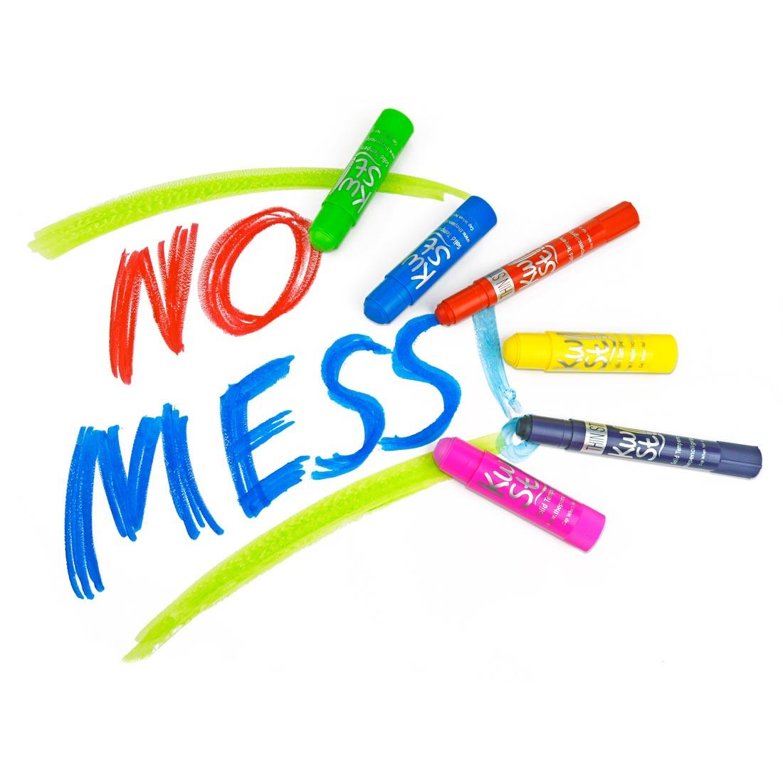 The words No Mess written in Kwik Stix Solid Tempera Paint with 6 open sticks