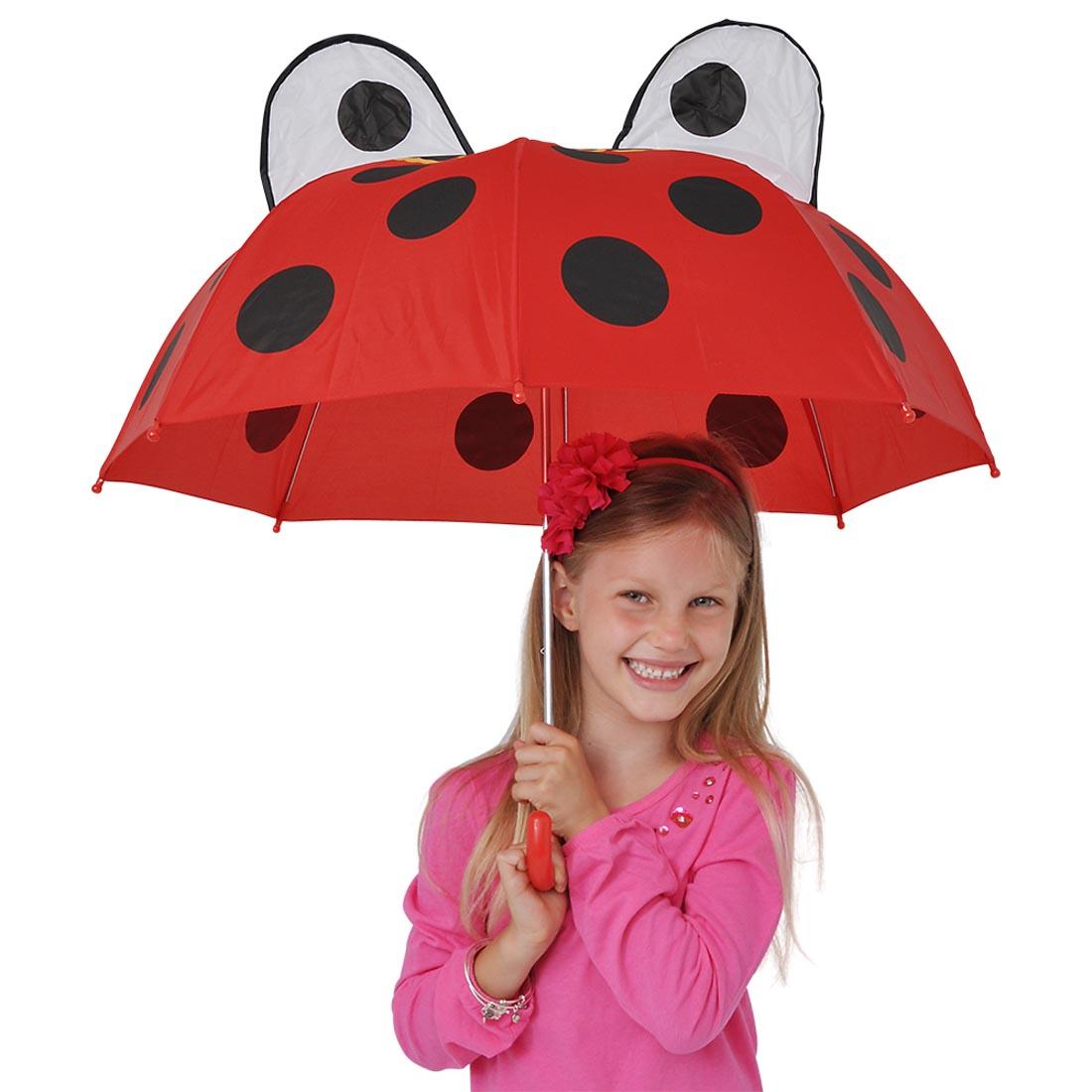 Child holding a Ladybug Umbrella