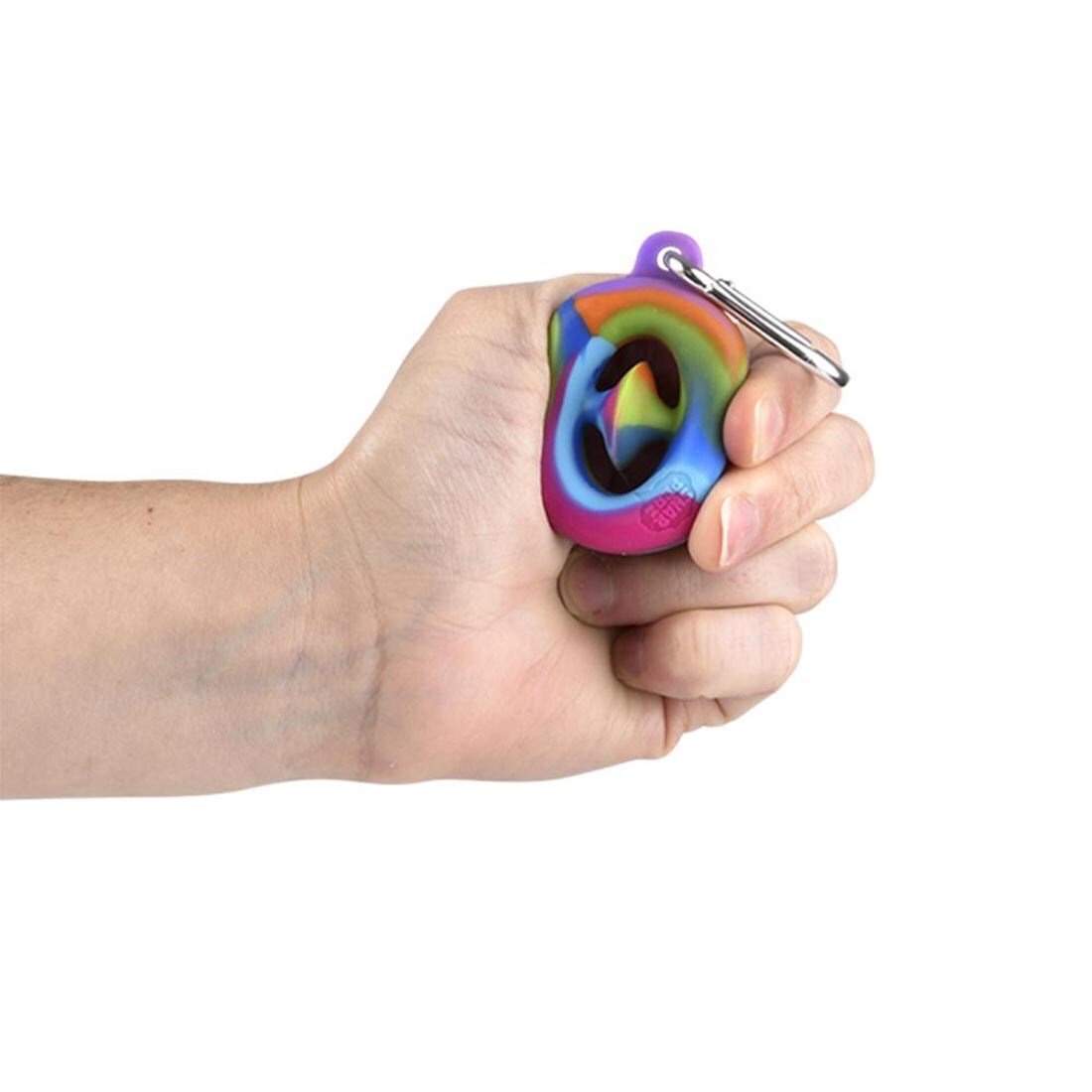 Hand squeezing a Mini Rainbow Snapperz Fidget Toy