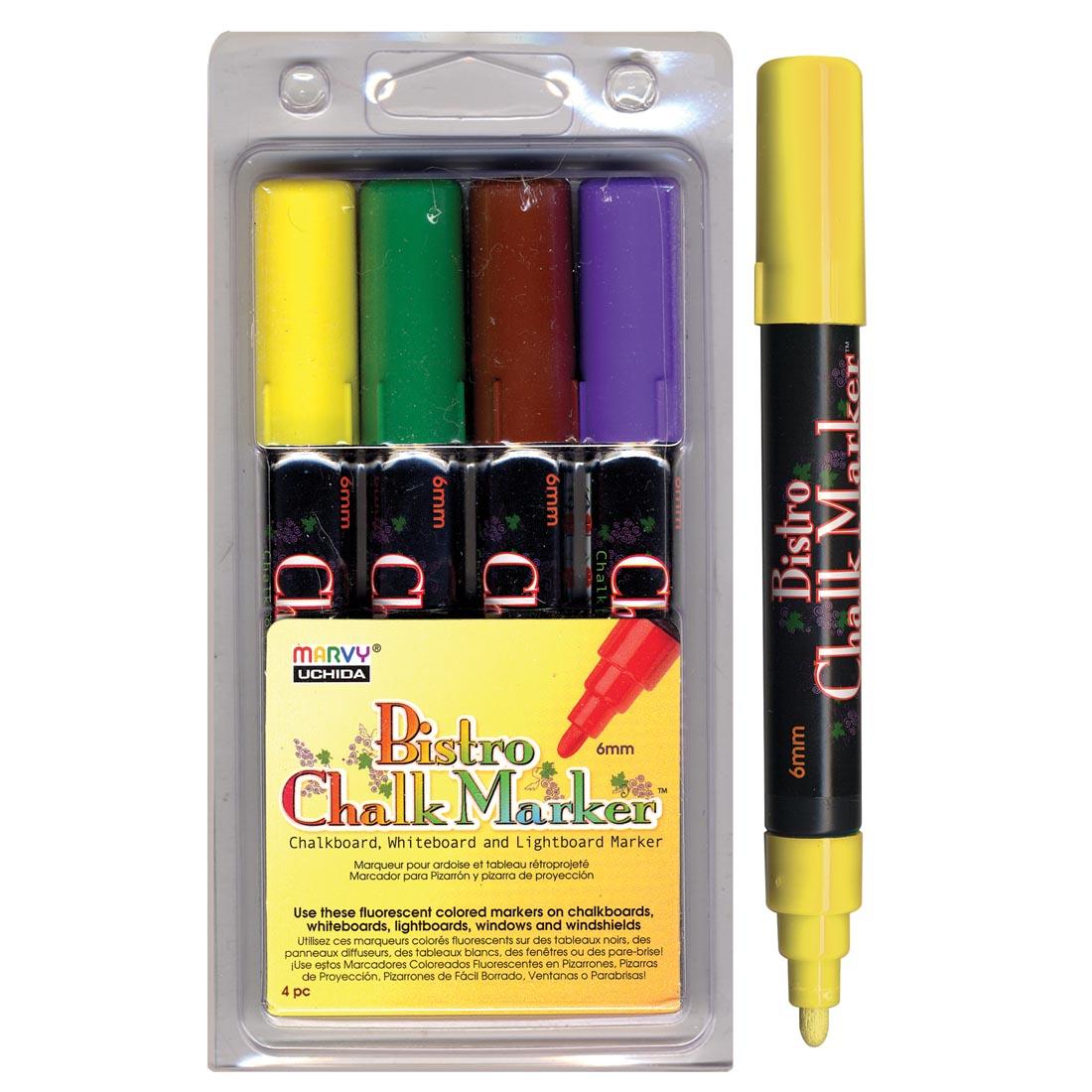 Marvy Bistro Chalk Marker Set D in package next to an individual yellow marker with cap on opposite end