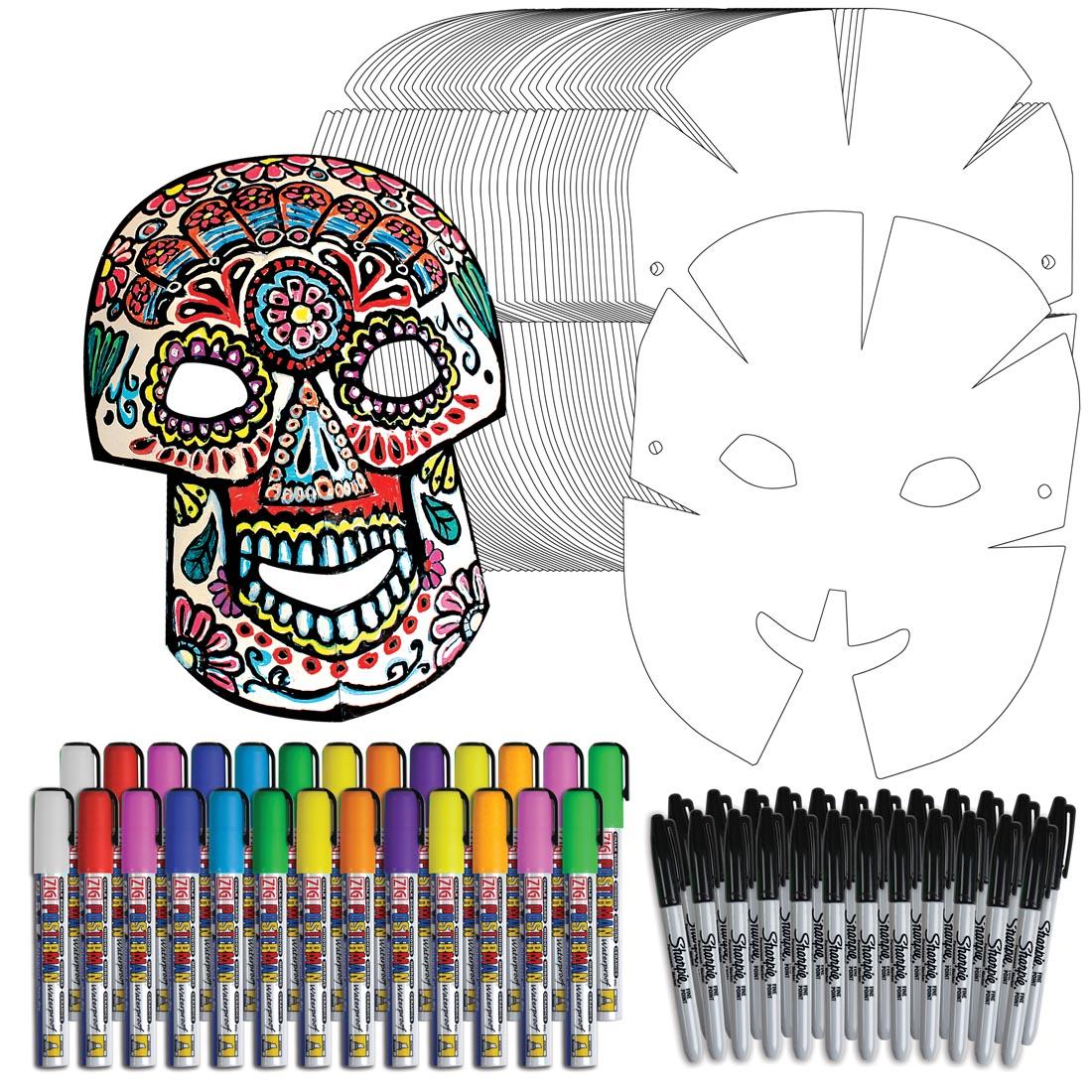 Contents of the Day of the Dead Paper Mask Project Kit plus an example of a completed mask