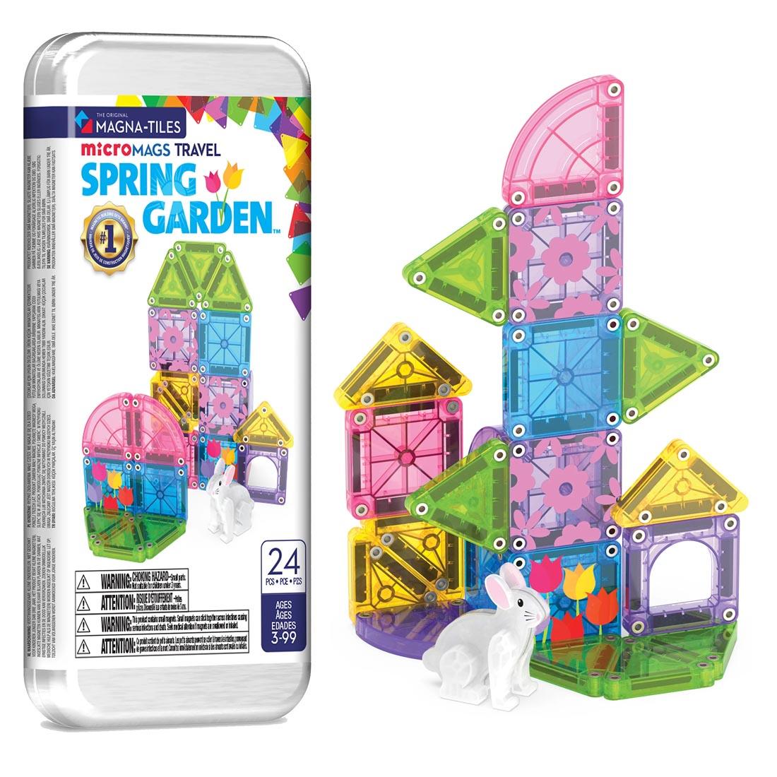 structure made with the Magna-Tiles microMAGS Spring Garden 24-Piece Travel Set beside its packaging