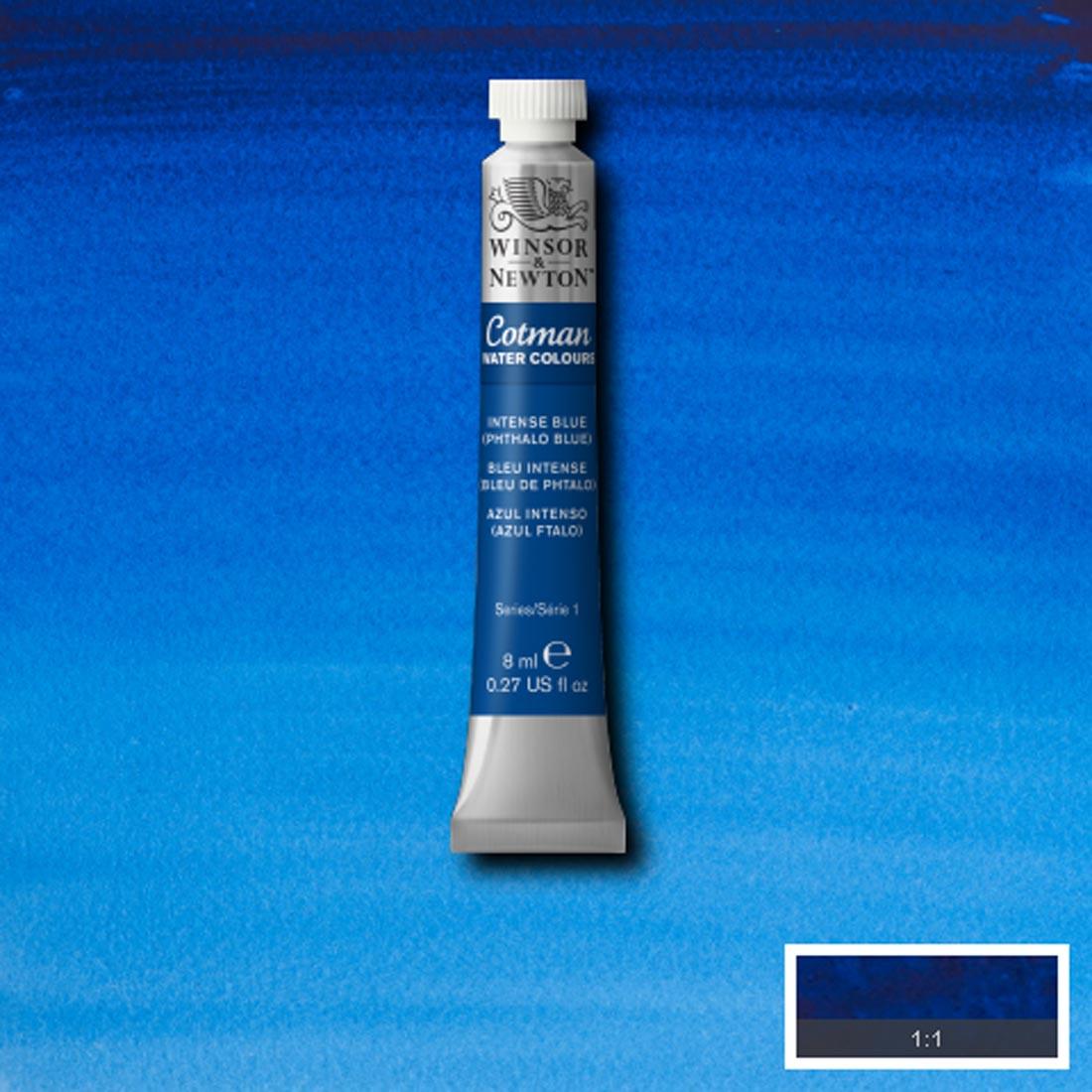 Tube of Intense Blue (Phthalo Blue) Winsor & Newton Cotman Water Colour with a paint swatch for the background
