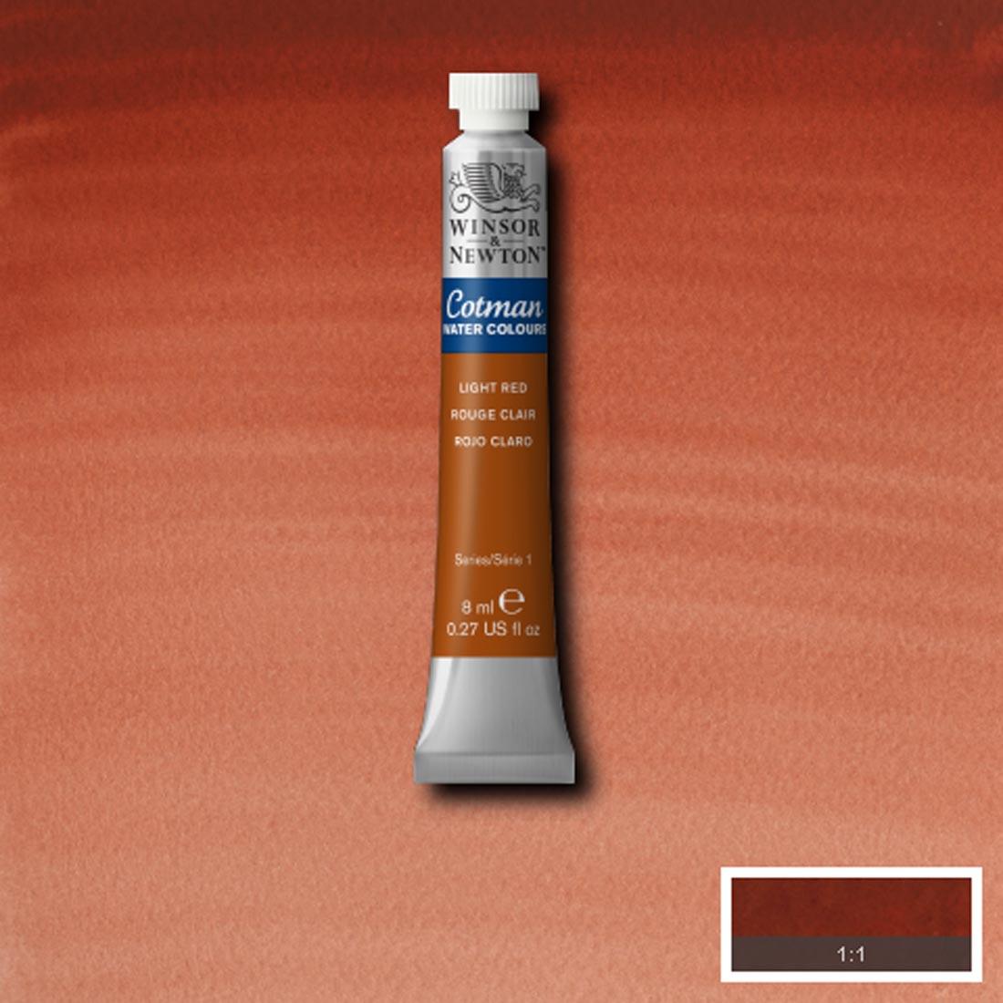 Tube of Light Red Winsor and Newton Cotman Water Colour with a paint swatch for the background