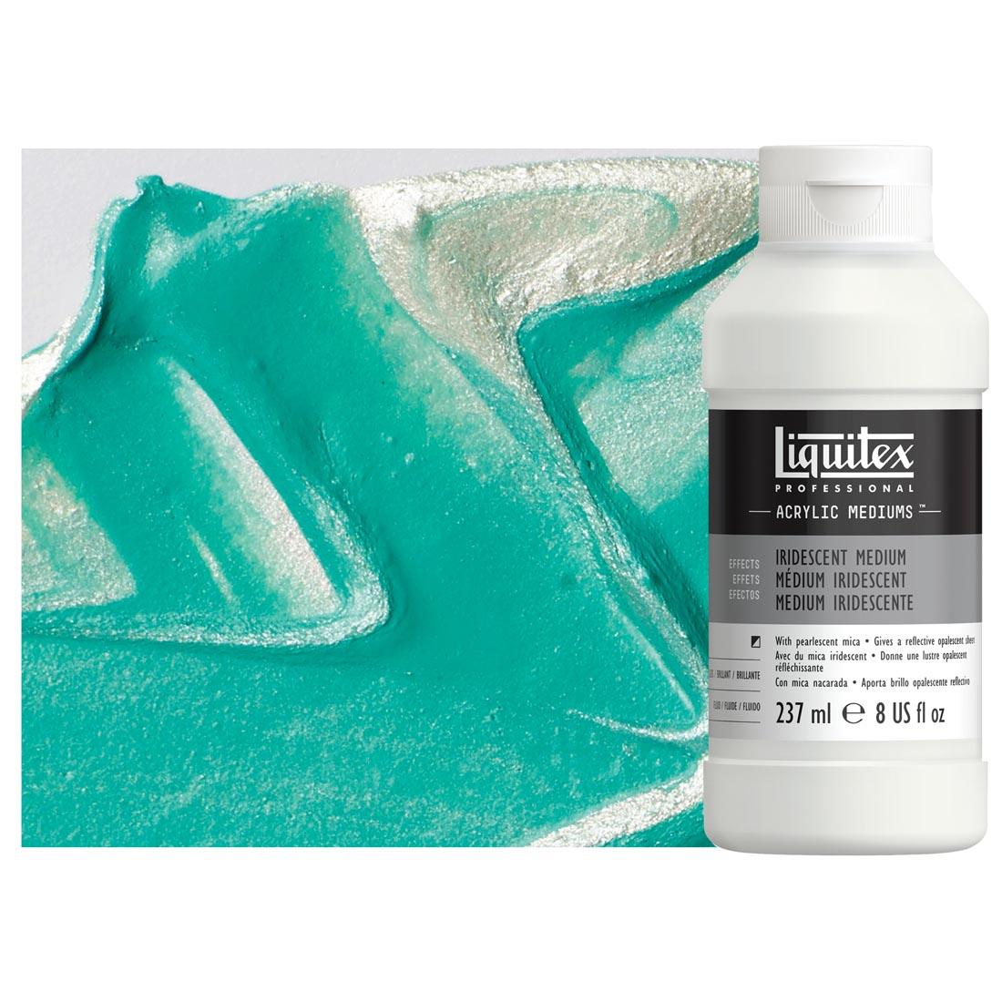 bottle of Liquitex Iridescent Medium with sample of medium mixed with paint in the background