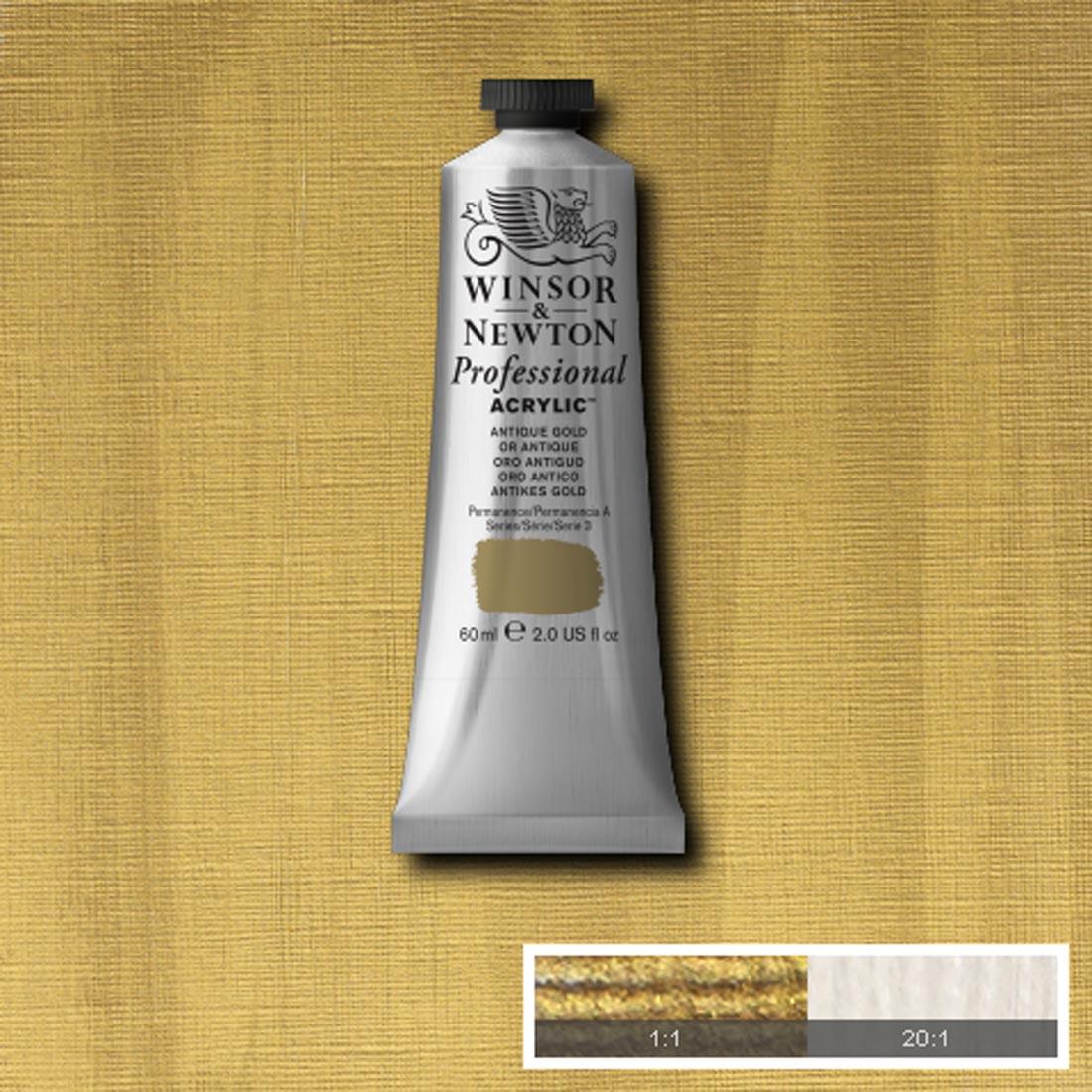 Tube of Winsor and Newton Professional Acrylic Antique Gold with paint swatch in the background