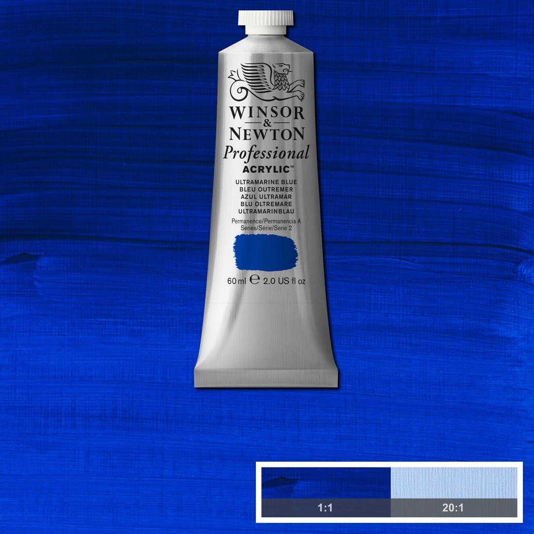 Tube of Ultramarine Blue Winsor and Newton Professional Acrylic with paint swatch in the background