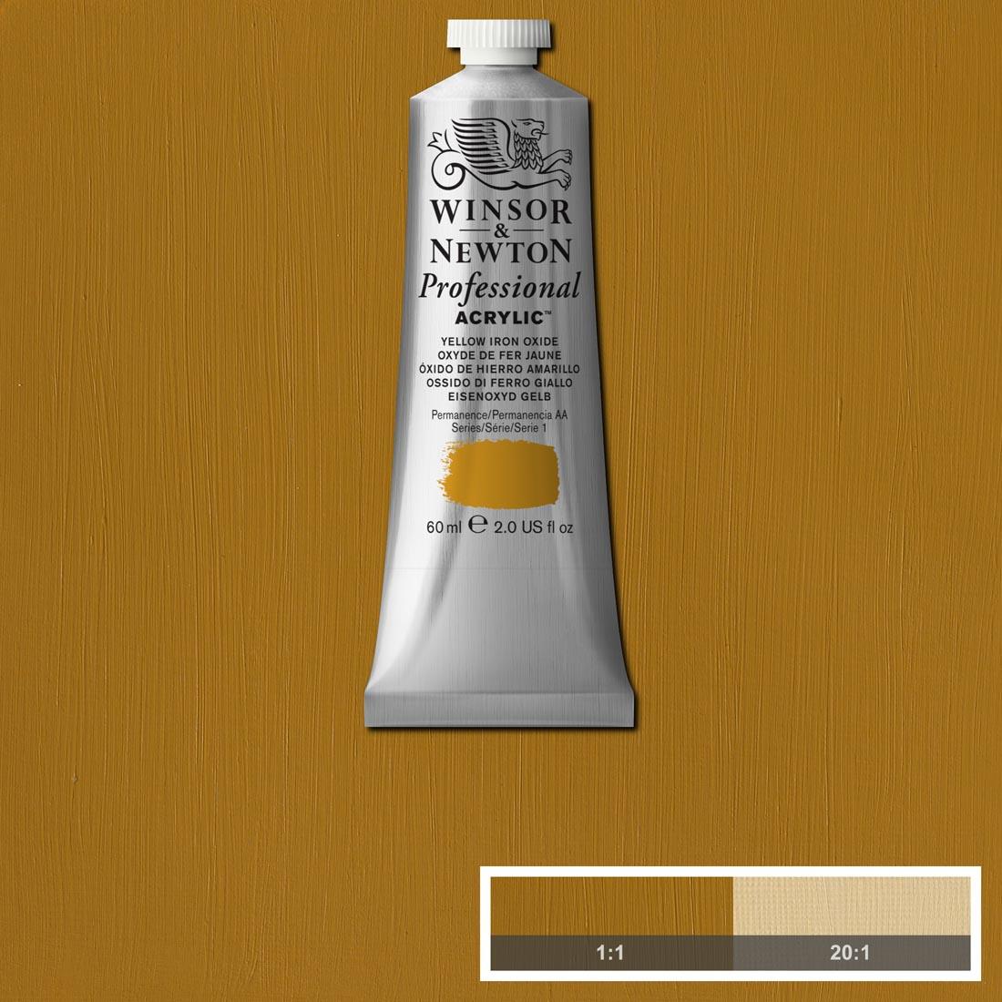 Tube of Yellow Iron Oxide Winsor and Newton Professional Acrylic with paint swatch in the background
