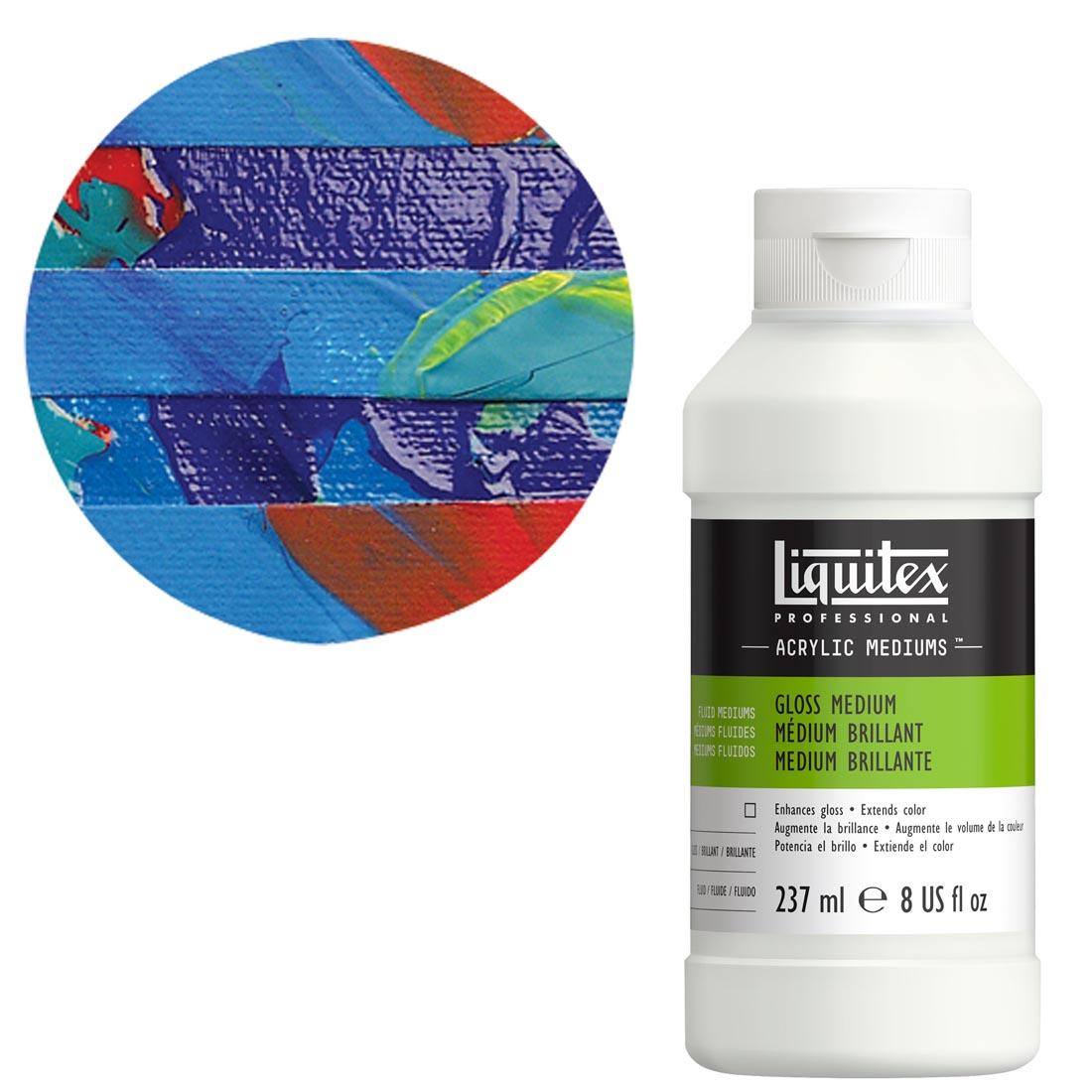 bottle of Liquitex Gloss Medium, 8 oz., with sample swatch in the background