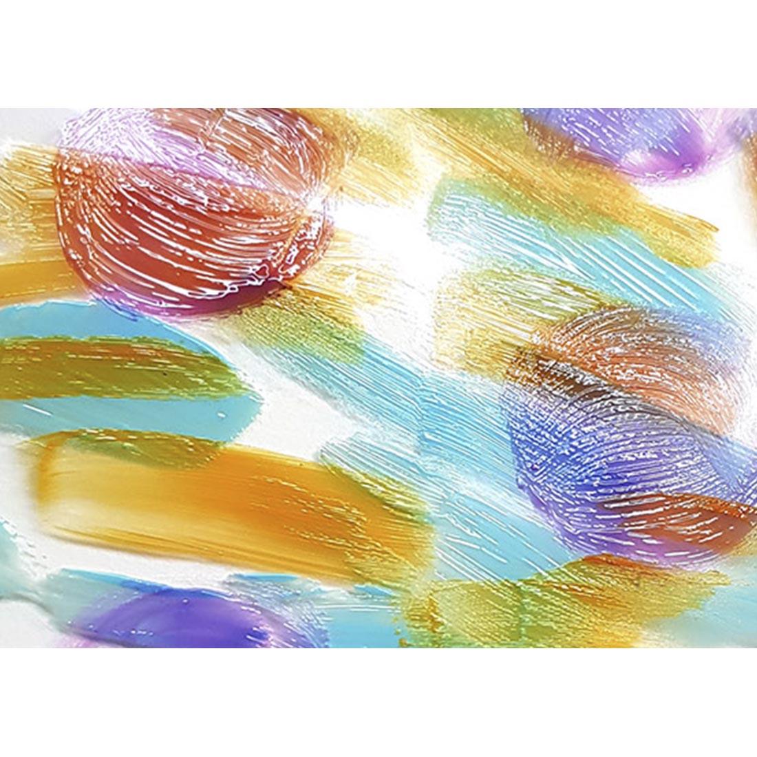 sample of Liquitex Glass Medium mixed with paint colors