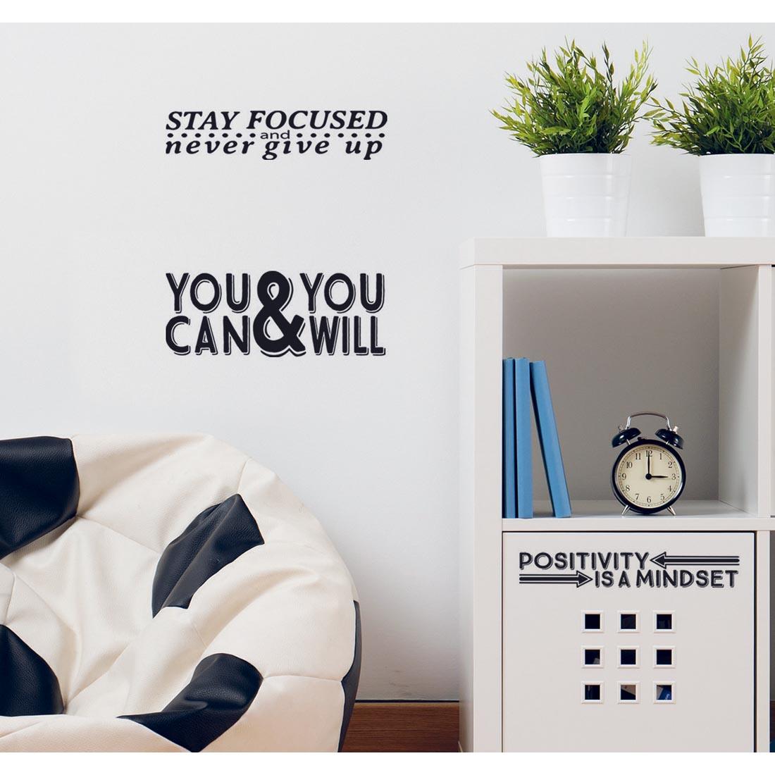 Wallies Written Success Vinyl Decals shown applied on a cabinet and wall